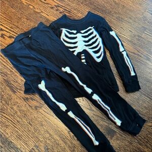 Glow in dark skeleton pajamas, size 4.